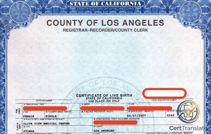 California Certificate of Live Birth from Los Angeles County with personal data redacted, illustrating the bilingual translation challenge for a Mexican consulate filing